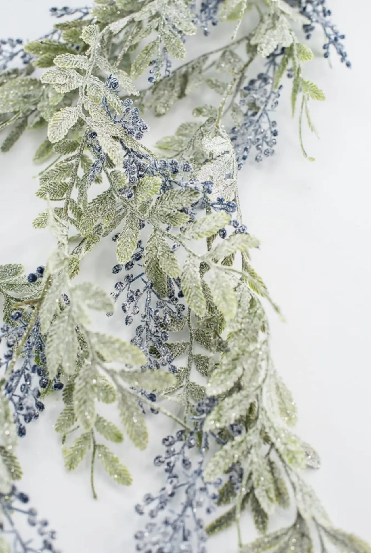 Artificial, frosted, hanging berry and leaves spray