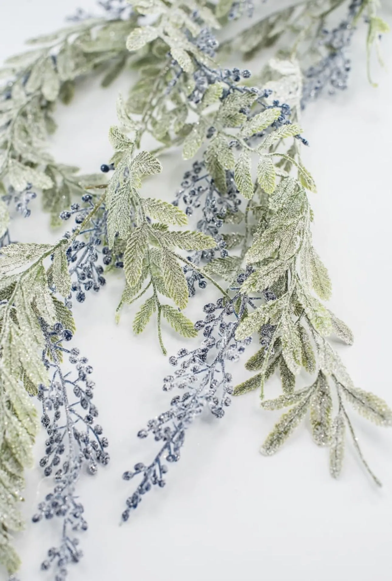 Artificial, frosted, hanging berry and leaves spray