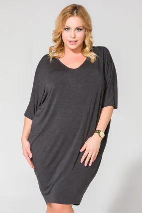 Elegant Draped V-Neck Knit Dress with Edgy Raw Hem Finish