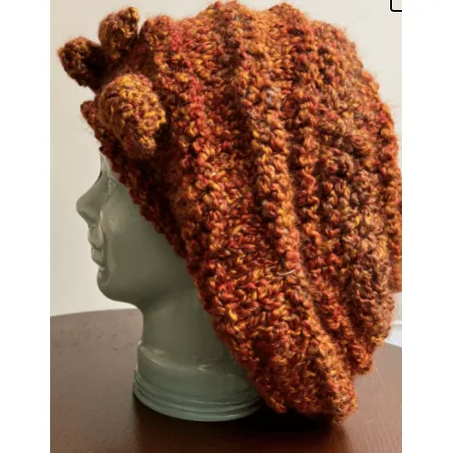 Handknit free form non wool Hat in rust tones and textures