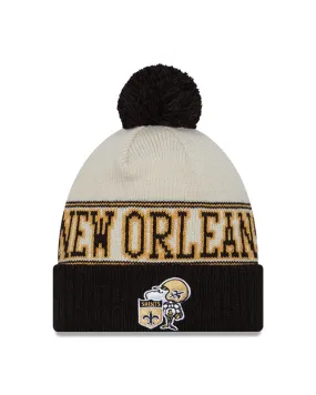New Orleans Saints New Era 2023 Sideline Historic Pom Cuffed Knit Hat - Cream/Black