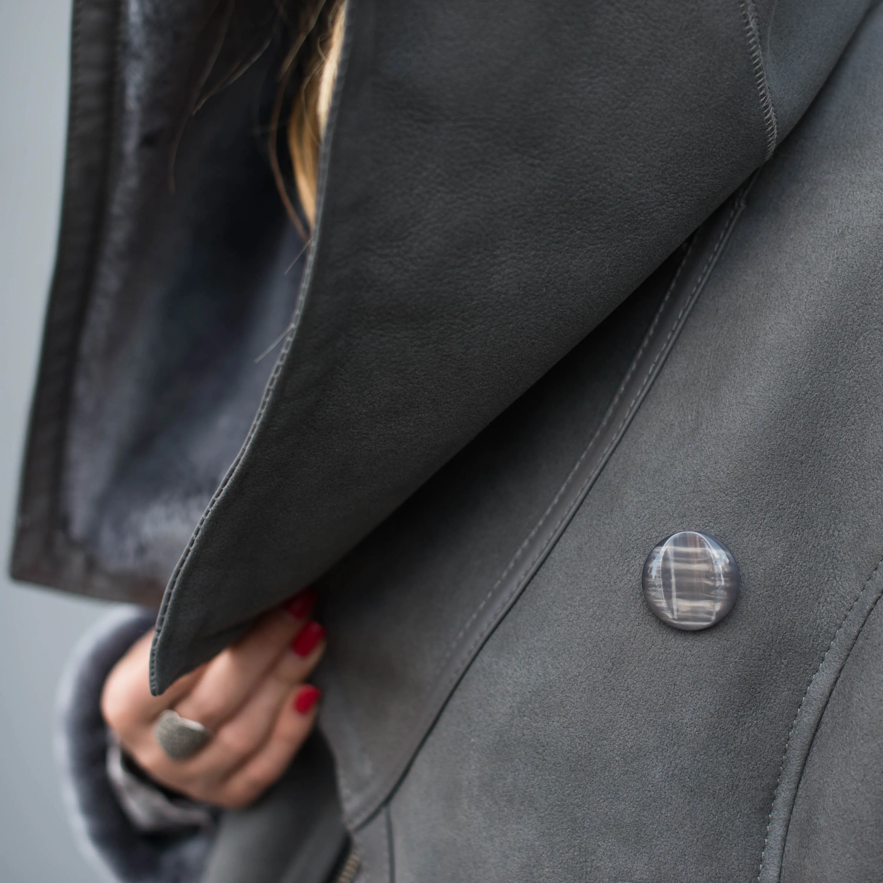 Shearling leather hooded jacket in grey