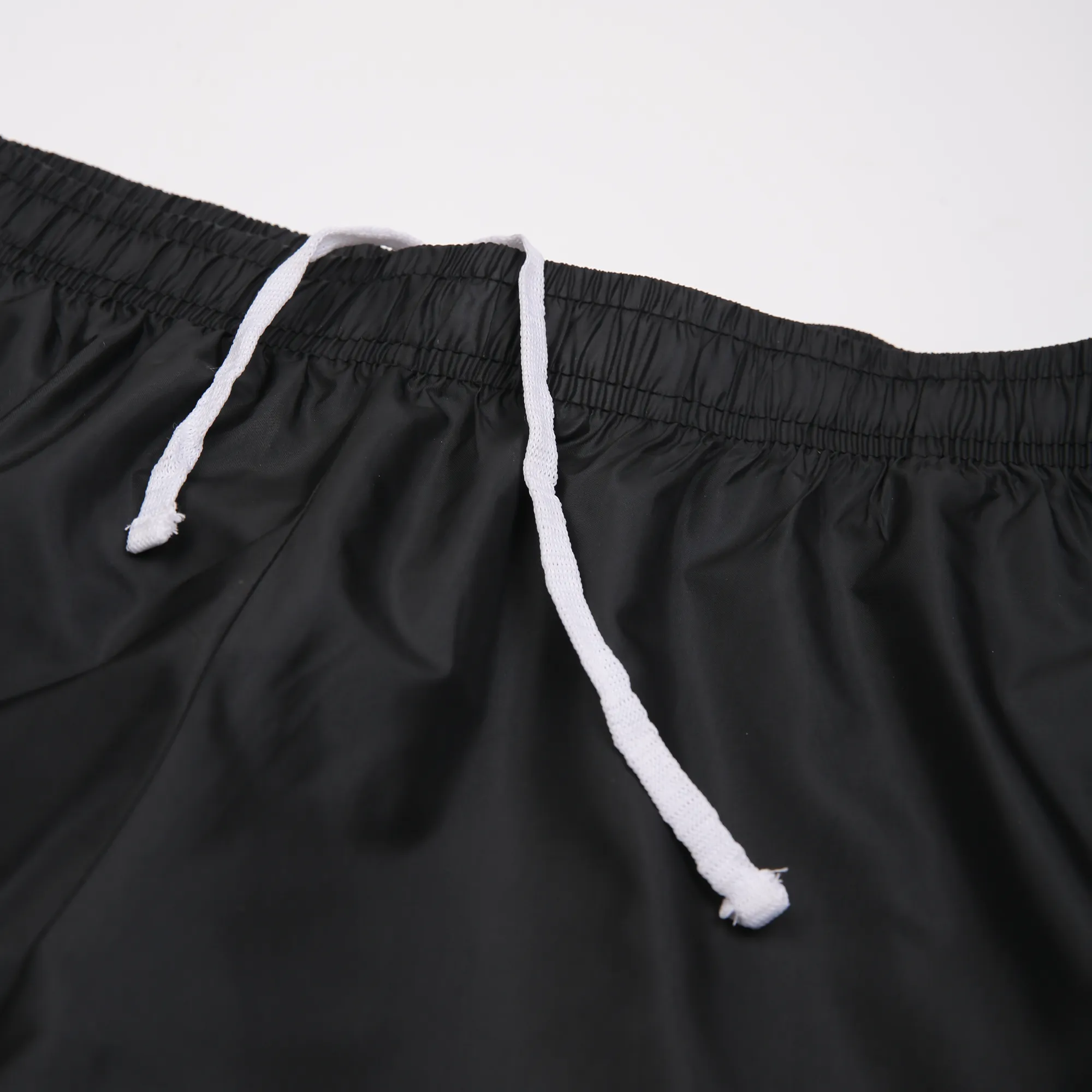 Women Black NS Loose Fit Solid Training Woven Joggers