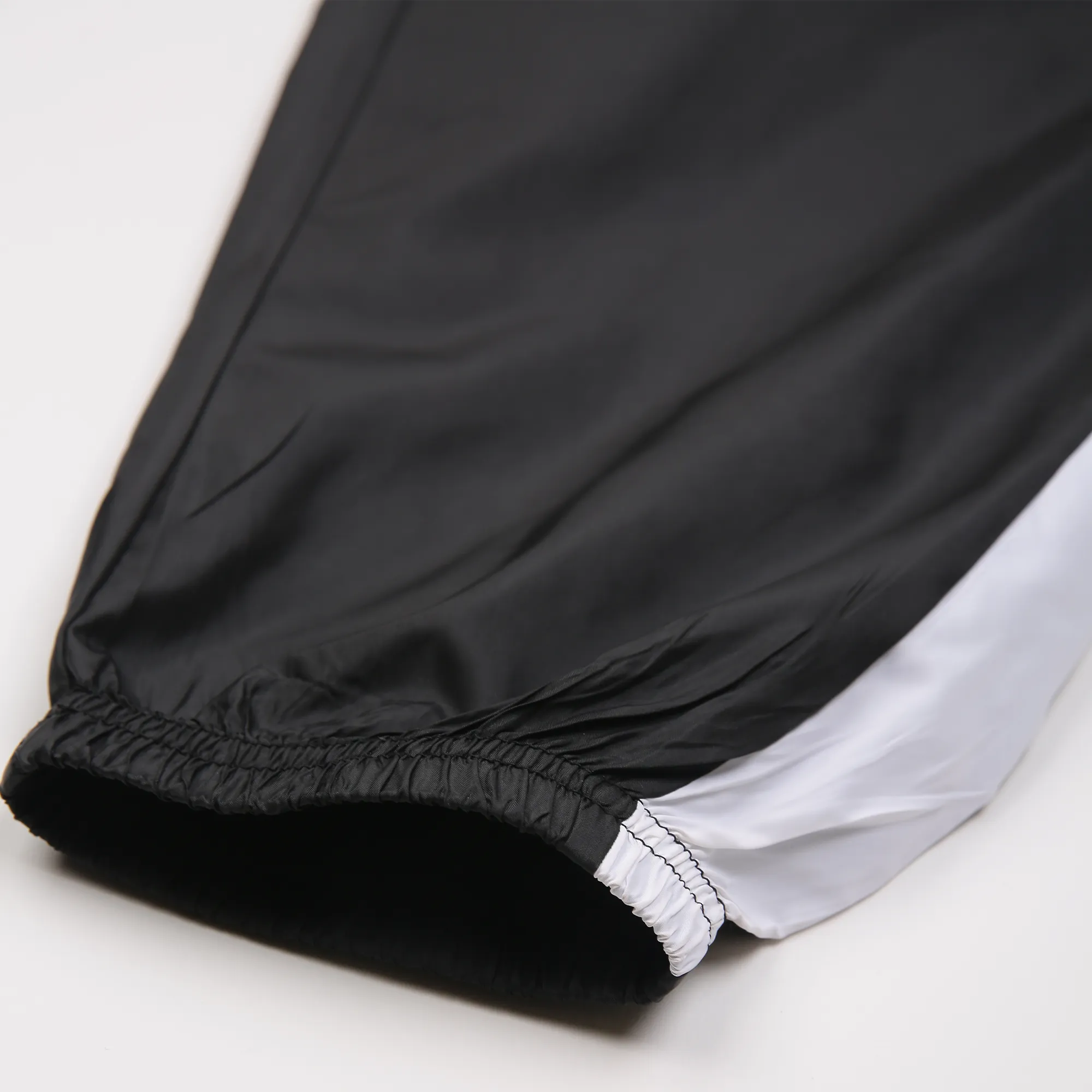 Women Black NS Loose Fit Solid Training Woven Joggers