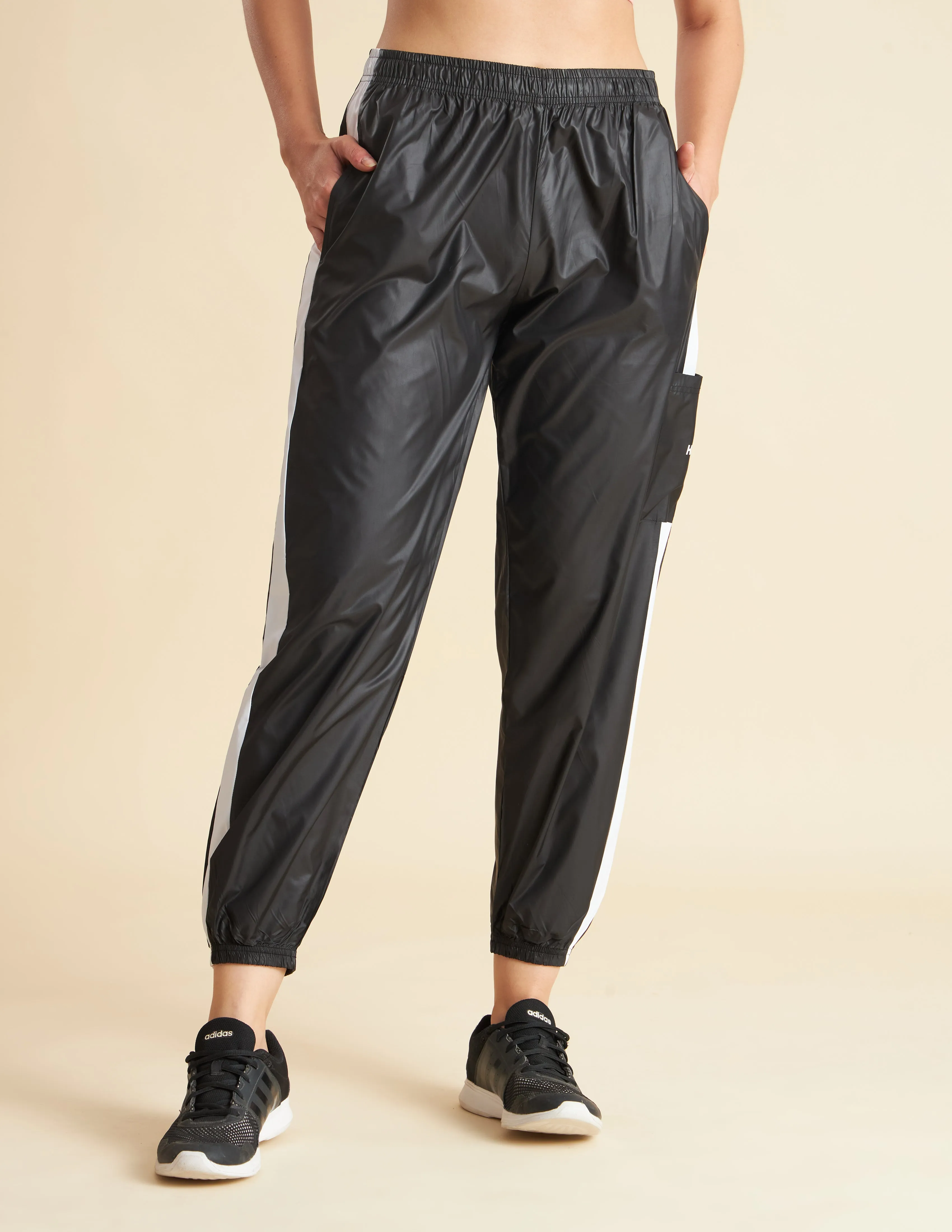 Women Black NS Loose Fit Solid Training Woven Joggers