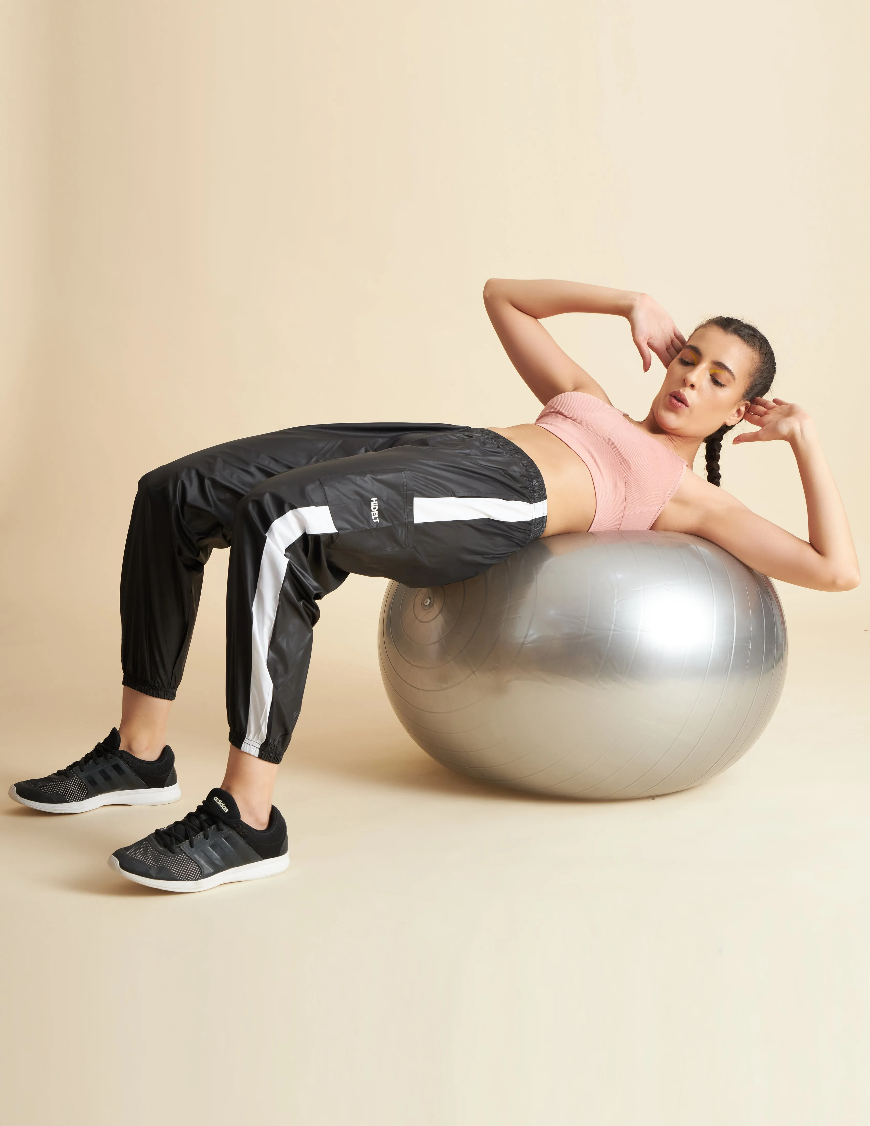 Women Black NS Loose Fit Solid Training Woven Joggers