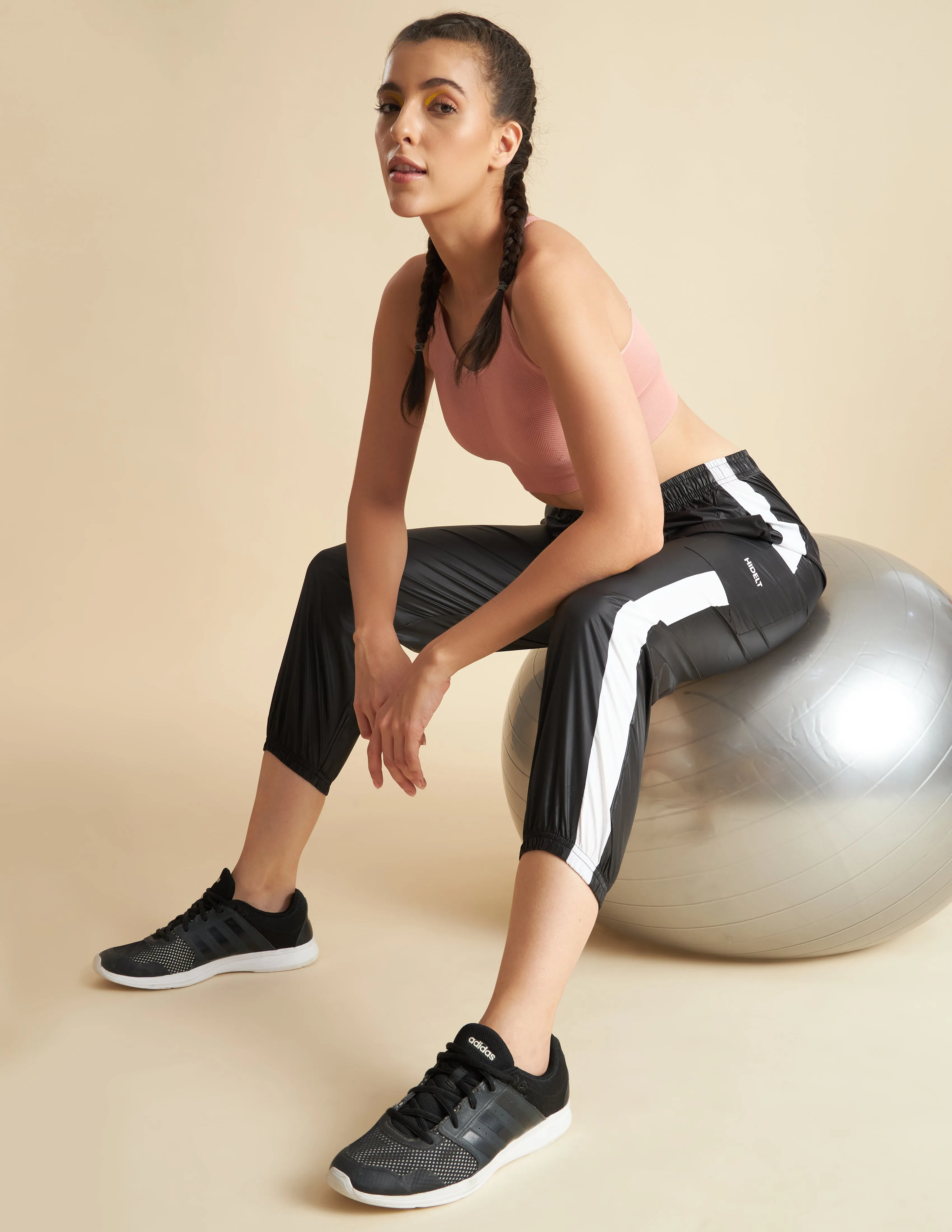Women Black NS Loose Fit Solid Training Woven Joggers