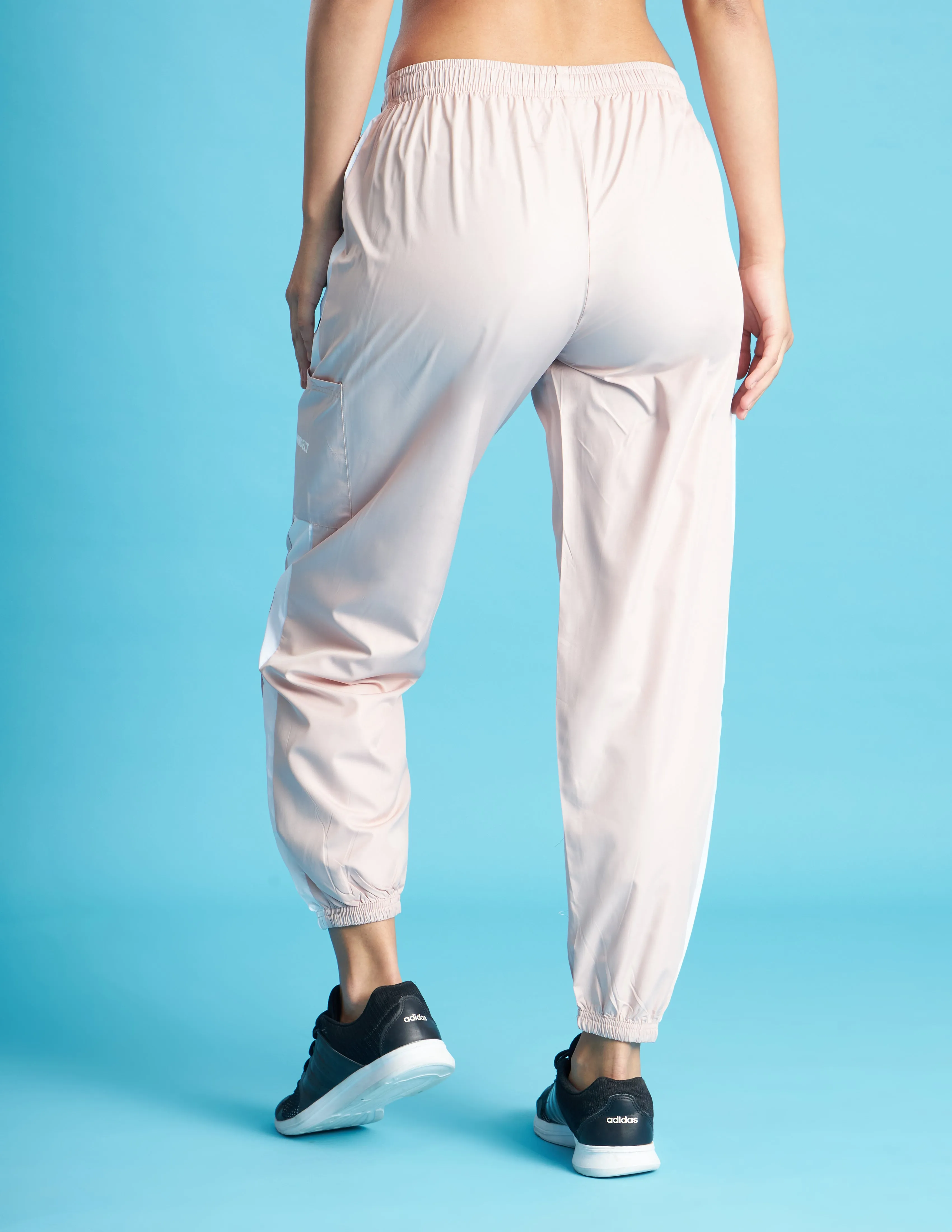 Women Peach NS Loose Fit Solid Training Woven Joggers